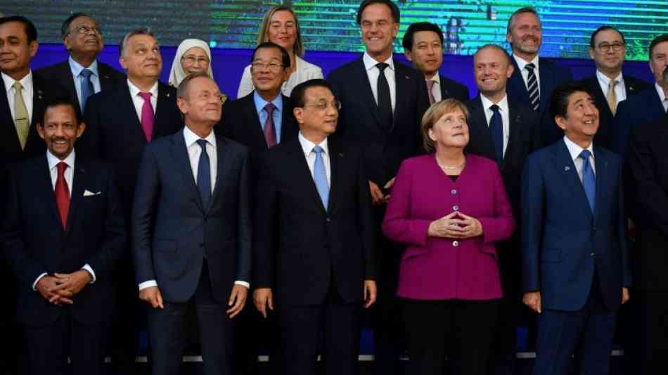 Europa und Asien zeigen in Brüssel Flagge gegen Trumps Kurs