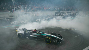 Hamilton ends Mercedes era with cheers, tears and a rousing drive