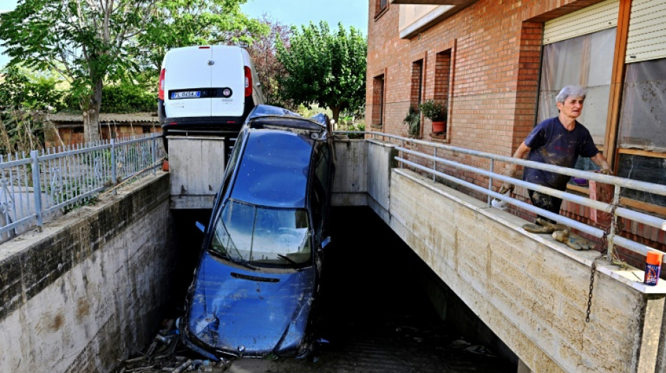 'Like a waterfall': Italy storms kill 10, spark climate debate