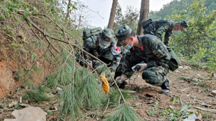 Recovery of crashed China Eastern jet hampered by heavy rain