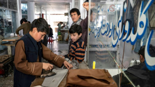 Afghan tailors outfit Eid celebrations with gleaming garb