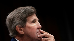 US envoy Kerry calls for 'urgent action' on climate at China talks